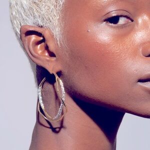 Rose gold crystal intertwined hoop earrings